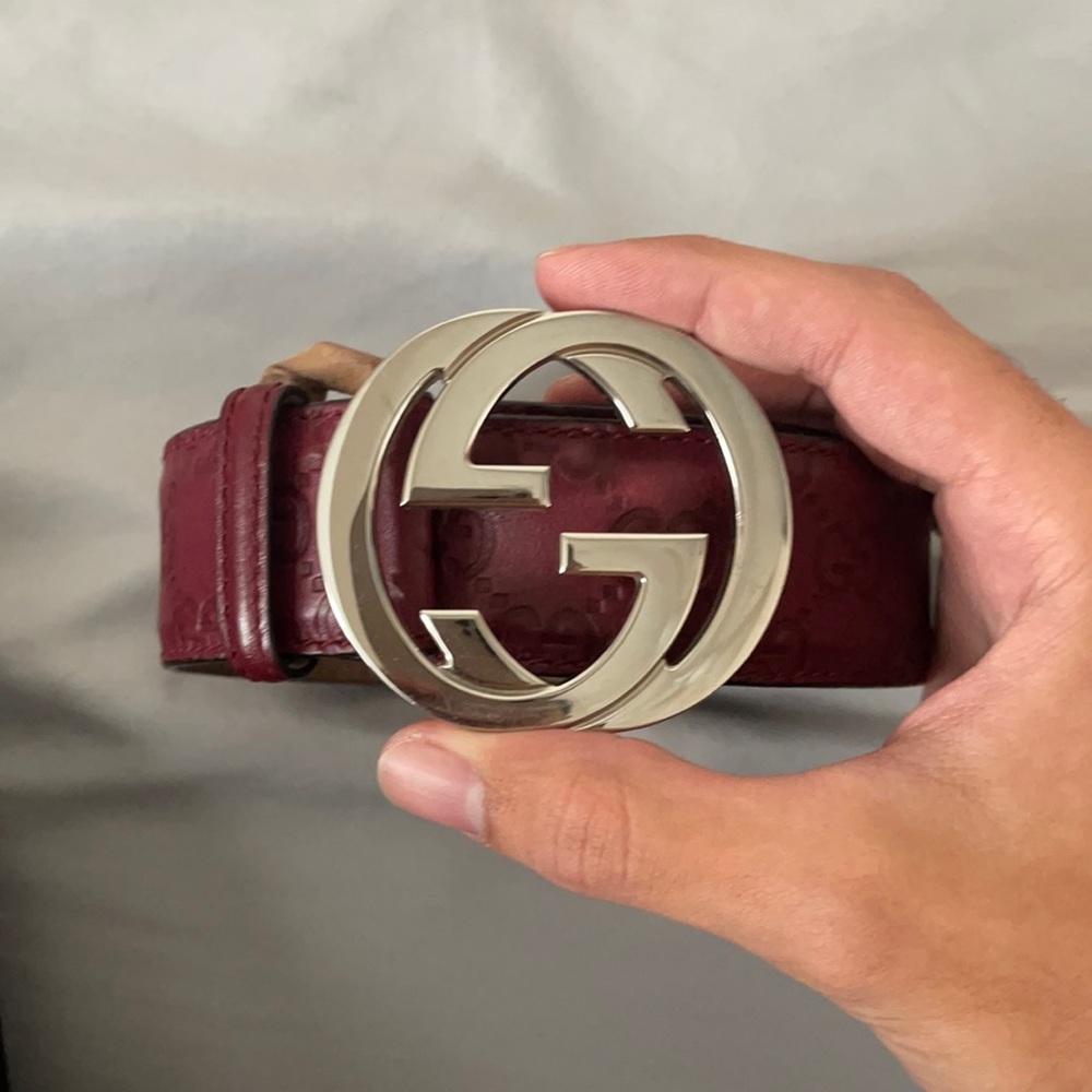 Authentic Gucci red interlocking G monogram with silver buckle.